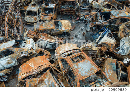 War in Ukraine: a dump of shot and burned cars in Irpin, Bucha district War in Ukraine: a dump of shot and burned cars in Irpin, Bucha district 90909689