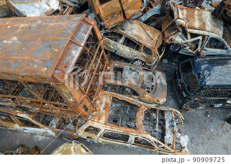 War in Ukraine: a dump of shot and burned cars in Irpin, Bucha district War in Ukraine: a dump of shot and burned cars in Irpin, Bucha district 90909725