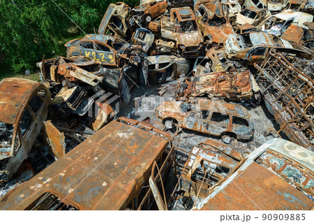 War-destroyed cars in Irpin, Bucha district, Ukraine War-destroyed cars in Irpin, Bucha district, Ukraine 90909885