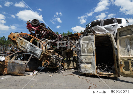 War in Ukraine: a dump of shot and burned cars in Irpin, Bucha district War in Ukraine: a dump of shot and burned cars in Irpin, Bucha district 90910072