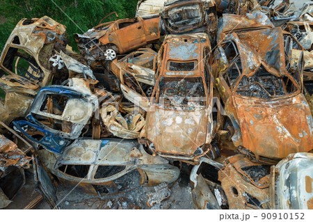 War-destroyed cars in Irpin, Bucha district, Ukraine 90910152