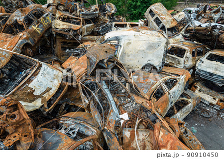 War-destroyed cars in Irpin, Bucha district, Ukraine War-destroyed cars in Irpin, Bucha district, Ukraine 90910450