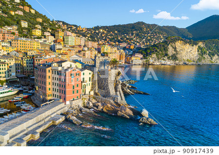 Scenic Mediterranean riviera coast. Panoramic view of Camogli town in Liguria, Italy Scenic Mediterranean riviera coast. Panoramic view of Camogli town in Liguria, Italy 90917439