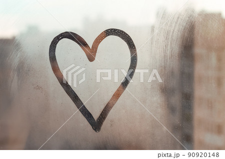 Doodle heart painted on glass wet blu window at home Doodle heart painted on glass wet blu window at home 90920148