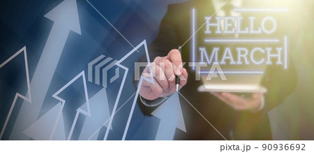 Handwriting text Hello March. Word Written on musical composition usually in duple or quadruple with beat Lady in suit holding pen symbolizing successful teamwork accomplishments. 90936692