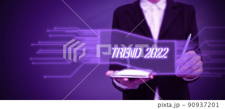 Text caption presenting Trend 2022. Internet Concept things that is famous for short period of time in current year Lady in suit holding pen symbolizing successful teamwork accomplishments. Text caption presenting Trend 2022. Internet Concept things that is famous for short period of time in current year Lady in suit holding pen symbolizing successful teamwork accomplishments. 90937201