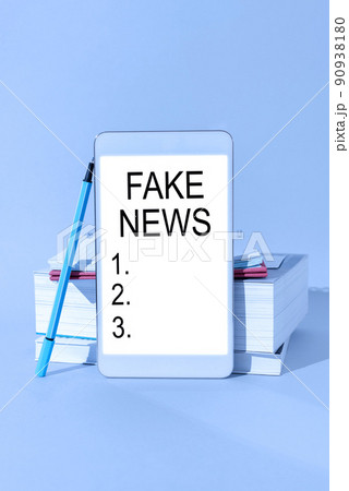 Conceptual caption Fake News. Internet Concept Giving information to showing that is not true by the media -47501 Conceptual caption Fake News. Internet Concept Giving information to showing that is not true by the media -47501 90938180