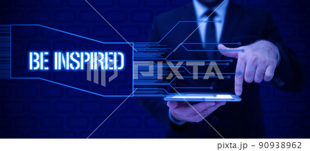 Conceptual display Be Inspired. Word Written on extraordinary quality as arising from some creative impulse Businessman in suit holding notepad symbolizing successful teamwork. 90938962
