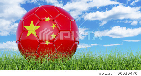 Soccer ball with Chinese flag on the green grass against blue sky, 3D rendering Soccer ball with Chinese flag on the green grass against blue sky, 3D rendering 90939470