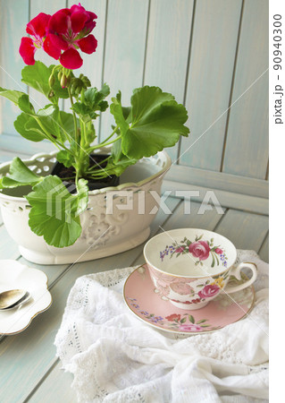 Women holidays concept. Vintage cup with flowers. 90940300