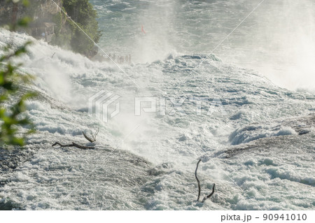 Fast currents in Rhine Falls in spring. 90941010