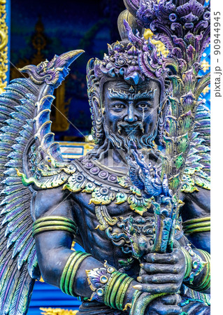 The Blue - Turquiose metalic God statue in Thai blue temple, at the North of Thailand. 90944945