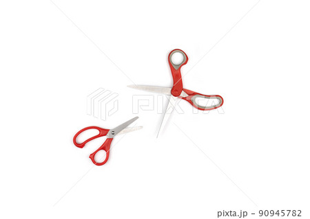 two red scissors, one big, one small are isolated on white background. Clipping paths two red scissors, one big, one small are isolated on white background. Clipping paths 90945782