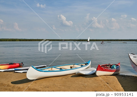 Canoes ans SUPs on the Lakeside 90953141