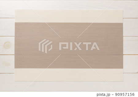 Top view of grey tablecloth for food on wooden background. Empty space for your design 90957156