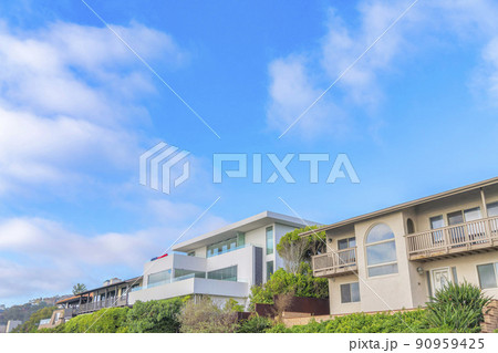Low angle view of buildings with railings on the balconies at La Jolla, San Diego, California Low angle view of buildings with railings on the balconies at La Jolla, San Diego, California 90959425