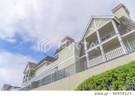 Low angle view of a fenced townhouses with balconies at Carlsbad, San Diego, California Low angle view of a fenced townhouses with balconies at Carlsbad, San Diego, California 90959524
