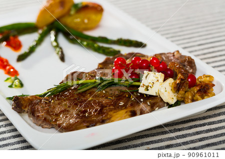 Veal with baked vegetables is tasty dish Veal with baked vegetables is tasty dish 90961011