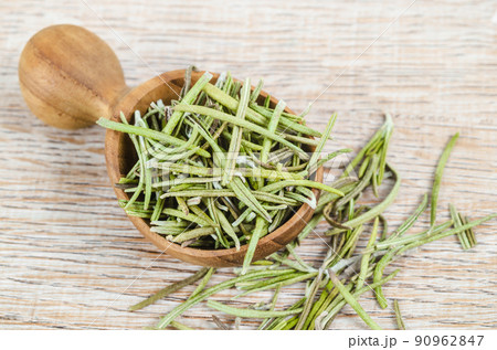 Dried rosemary spice in wooden spoon. Macro with shallow depth of field. Dried rosemary spice in wooden spoon. Macro with shallow depth of field. 90962847