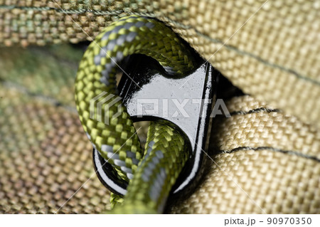 Close up still life of a green army tactical backpack Close up still life of a green army tactical backpack 90970350