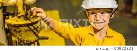 Boy operator recording operation of oil and gas process at oil and rig plant, offshore oil and gas industry, offshore oil and rig in the sea, operator monitor production process, routine daily record Boy operator recording operation of oil and gas process at oil and rig plant, offshore oil and gas industry, offshore oil and rig in the sea, operator monitor production process, routine daily record 90972323