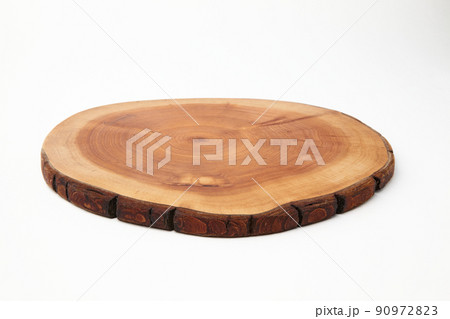 Wooden stand for a dish isolated on a white background. Tree trunk cut for product presentation Wooden stand for a dish isolated on a white background. Tree trunk cut for product presentation 90972823