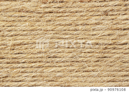 Shaggy fleecy rope. Linen rope texture. Rough natural background Shaggy fleecy rope. Linen rope texture. Rough natural background 90976108