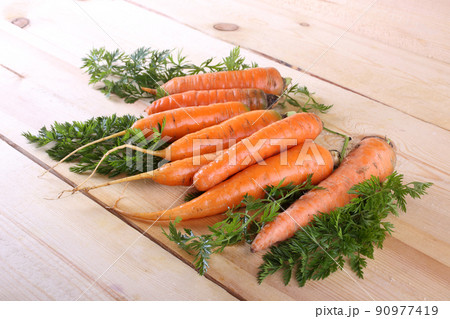 Carrots on table Carrots on table 90977419
