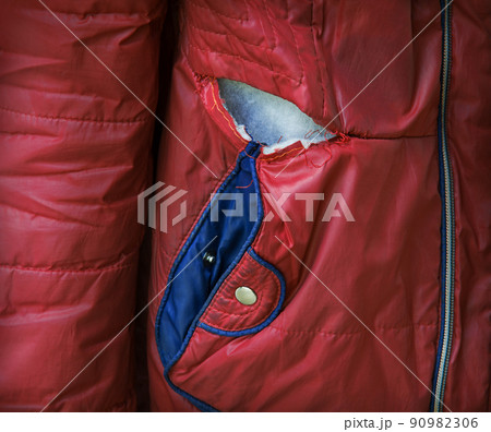 Down jacket torn at the seam Down jacket torn at the seam 90982306