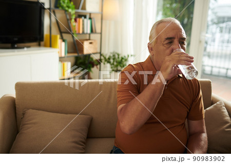 Elderly Man Drinking Water Elderly Man Drinking Water 90983902