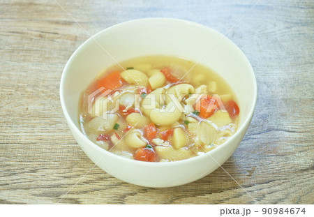 boiled macaroni chicken with potato soup on bowl boiled macaroni chicken with potato soup on bowl 90984674