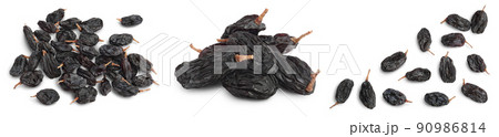Black raisin isolated on white background. Top view. Flat lay. Set or collection Black raisin isolated on white background. Top view. Flat lay. Set or collection 90986814