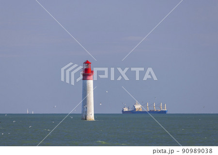 Phare de Chauvea near Ile de Re with ships to La Rochelle, Pays de la Loire, France Phare de Chauvea near Ile de Re with ships to La Rochelle, Pays de la Loire, France 90989038