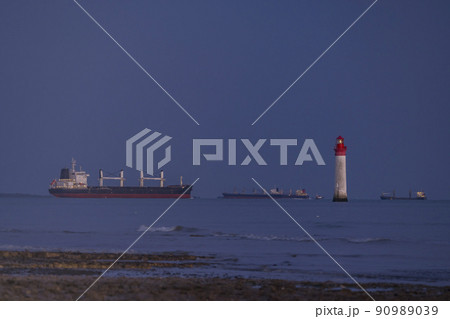 Phare de Chauvea near Ile de Re with ships to La Rochelle, Pays de la Loire, France Phare de Chauvea near Ile de Re with ships to La Rochelle, Pays de la Loire, France 90989039
