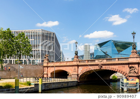 Scenic panoramic view of modern business center near Berlin railway central station from tourist ship sailing on river Spree near Moltke bridge on sunny day. Germany travel destiantaion concept 90989407