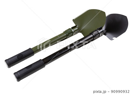 two folding sapper or tourist shovels, black and green, on a white background 90990932