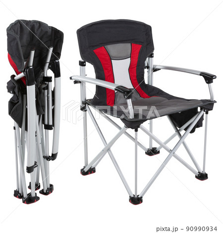 two folding camping chairs in different states, one folded, the other unfolded 90990934