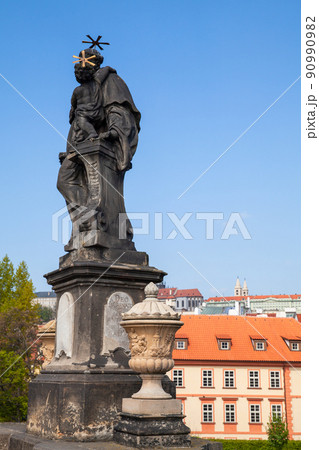 Saint Anthony statue at the Charles bridg. Prague. Czech Republic 90990982