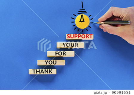 Thank you for support symbol. Concept words Thank you for your support on wooden blocks on a beautiful blue table blue background. Businessman hand. Business and thank you for support concept. Thank you for support symbol. Concept words Thank you for your support on wooden blocks on a beautiful blue table blue background. Businessman hand. Business and thank you for support concept. 90991651