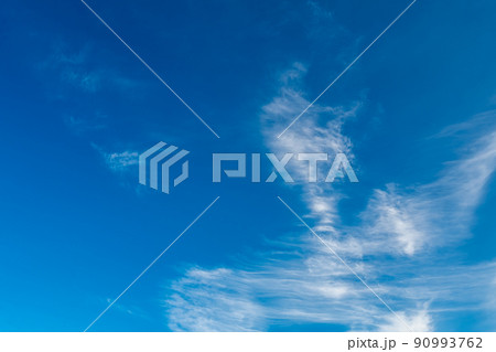 beautiful cirrus white clouds in the blue sky 90993762
