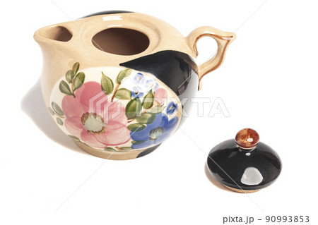 Teapot with pattern isolated in white background. 90993853