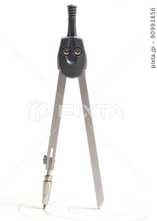 Metallic drawing compass isolated on white background Metallic drawing compass isolated on white background 90993856