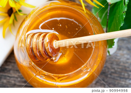 fresh honey with honeycombs 90994998
