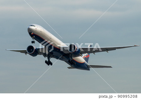 Plane Boeing 777-300 Aeroflot - Russian Airlines at Sheremetyevo airport in Moscow. Plane Boeing 777-300 Aeroflot - Russian Airlines at Sheremetyevo airport in Moscow. 90995208