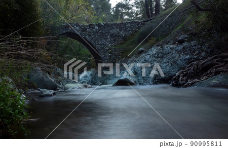 Ancient stone Venetian bridge in the Troodos mountains on the island of Cyprus. Ancient stone Venetian bridge in the Troodos mountains on the island of Cyprus. 90995811