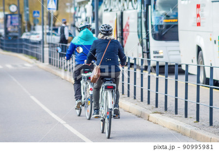 Cyclists on one of the streets in Stockholm. 90995981