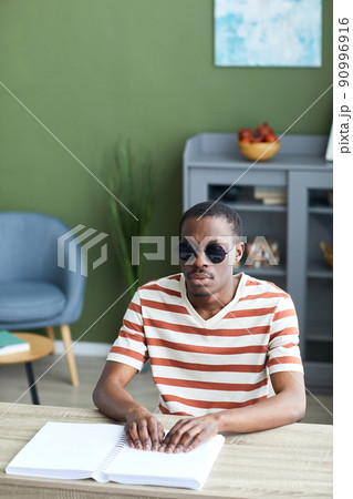 African American Blind Man Reading 90996916