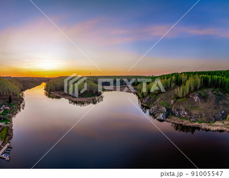 Confluence of the Iset and Kamenka rivers in the city Kamensk-Uralskiy. Iset and Kamenka rivers, Kamensk-Uralskiy, Sverdlovsk region, Ural mountains, Russia. Aerial view 91005547