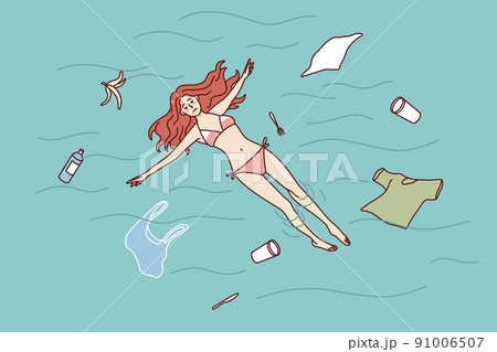 Unhappy woman swimming in polluted ocean Unhappy woman swimming in polluted ocean 91006507