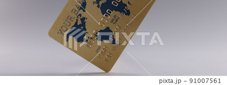 Credit plastic bank card on gray background Credit plastic bank card on gray background 91007561